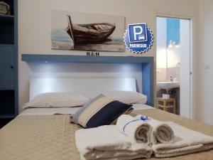 Postel nebo postele na pokoji v ubytování AlbaChiara B&B