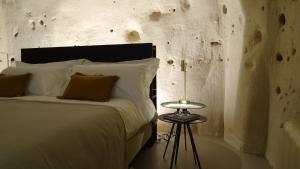 Postel nebo postele na pokoji v ubytování StageROOM01 - Matera