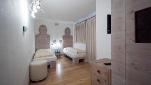 Postel nebo postele na pokoji v ubytování Chalet C'Est La Vie