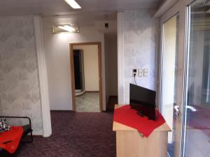 TV a/nebo společenská místnost v ubytování casa di Gino