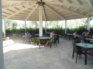 A restaurant or other place to eat at Tenuta Pigliano Hotel