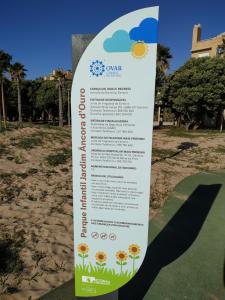a sign for a garden on the beach at Sun, Sky and Sea in Esmoriz