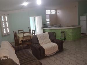 Et opholdsområde på Casa aBeira Mar 200 metros da praia Peruíbe + 11 billeder