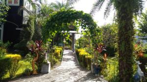 Vrt ispred objekta Happiness Homestay