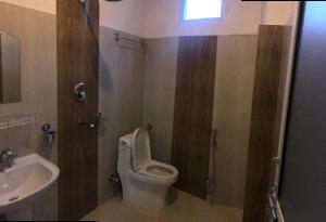 Ванна кімната в Hotel October Inn