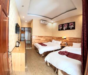 Postel nebo postele na pokoji v ubytování Dang Khoa Garden Inn Homestay