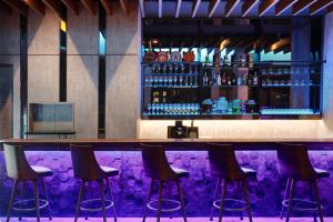 The lounge or bar area at ibis Kuala Lumpur City Centre