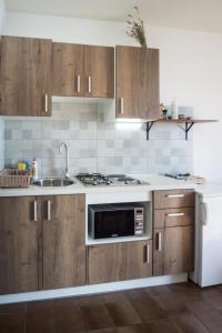 A kitchen or kitchenette at Apartments PODATOK 4