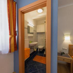 Ванная комната в Säuleck Appartement inkl Schibus
