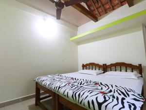 Hotel Rosary House客房内的一张或多张床位