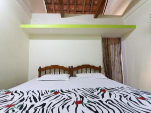Hotel Rosary House客房内的一张或多张床位