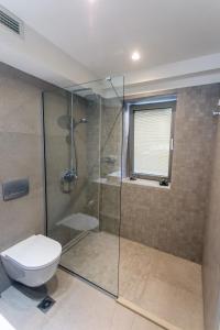 Kúpeľňa v ubytovaní Anemolia Parga Suites