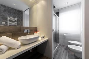 Kúpeľňa v ubytovaní Hotel Mediterraneo Ombrellone e Lettini Inclusi