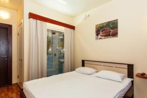 Cama o camas de una habitación en Discovery Hotel