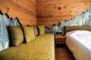 Postel nebo postele na pokoji v ubytování Hotel Cristallo