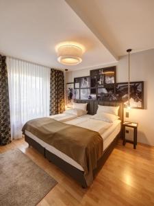 Postel nebo postele na pokoji v ubytování Art Hotel Superior + 37 fotografií