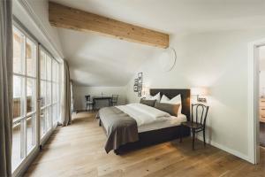 Un pat sau paturi într-o cameră la Chalet Stolz