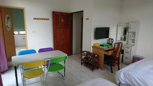 TV a/nebo společenská místnost v ubytování Garden Hostel