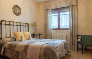 Łóżko lub łóżka w pokoju w obiekcie Casa Rural El Capricho
