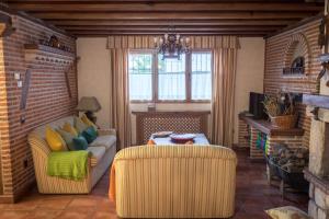 Część wypoczynkowa w obiekcie Casa Rural El Capricho