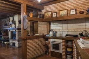 Kuchnia lub aneks kuchenny w obiekcie Casa Rural El Capricho