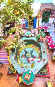 a childs play area with a swimming pool at Riad Dia in Marrakesh