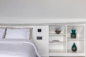 Postel nebo postele na pokoji v ubytování Canopée guesthouse