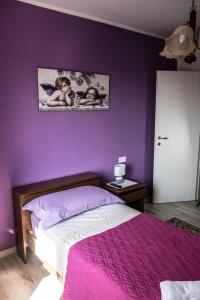 Katil atau katil-katil dalam bilik di LA VIGNA FIORITA B&b