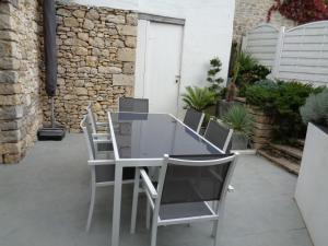 Патио или другая зона на открытом воздухе в petit paradis vallee de la dordogne proche de SARLAT et ROCAMADOUR