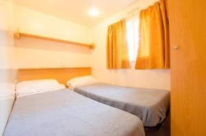 Postel nebo postele na pokoji v ubytování Camping Relax Ge