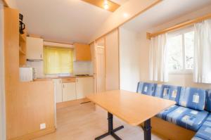 Kuchyň nebo kuchyňský kout v ubytování Camping Relax Ge