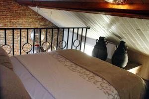 Tempat tidur dalam kamar di B&B Casa Luna Loft