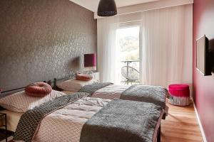 Posteľ alebo postele v izbe v ubytovaní Apartament Balance z prywatną sauną