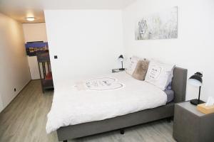 Postel nebo postele na pokoji v ubytování B&B Intermezzo