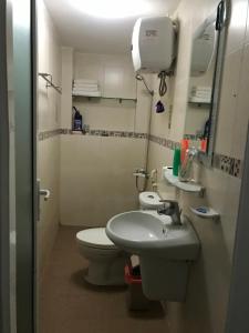 Koupelna v ubytování Khang Homestay