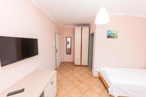 TV a/nebo společenská místnost v ubytování Hotel Heritage