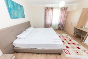 Postel nebo postele na pokoji v ubytování Hotel Heritage