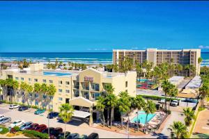 an aerial view of a hotel and the ocean at Comfort Suites Beachside in South Padre Island