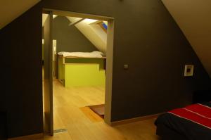Postel nebo postele na pokoji v ubytování Vakantiehuis Lazy house 6 tot 8 personen