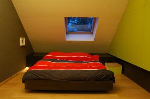 Postel nebo postele na pokoji v ubytování Vakantiehuis Lazy house 6 tot 8 personen