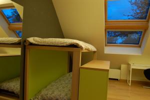 Postel nebo postele na pokoji v ubytování Vakantiehuis Lazy house 6 tot 8 personen