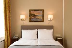 Postel nebo postele na pokoji v ubytování Boutique Hotel Splendid