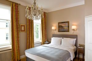 Postel nebo postele na pokoji v ubytování Boutique Hotel Splendid