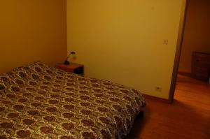 Postel nebo postele na pokoji v ubytování Vakantiehuis Lazy house 6 tot 8 personen