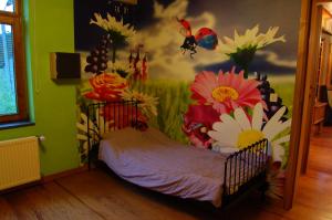 Postel nebo postele na pokoji v ubytování Vakantiehuis Lazy house 6 tot 8 personen