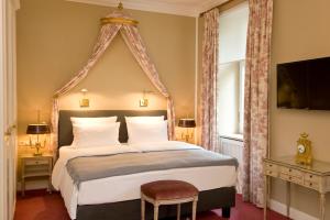 Postel nebo postele na pokoji v ubytování Boutique Hotel Splendid