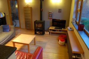 Posezení v ubytování Vakantiehuis Lazy house 6 tot 8 personen