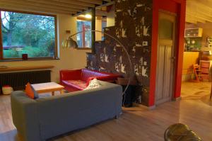 Posezení v ubytování Vakantiehuis Lazy house 6 tot 8 personen