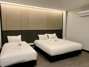 Letto o letti in una camera di Orasa hotel