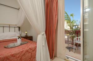 Posteľ alebo postele v izbe v ubytovaní Aeolis Boutique Hotel